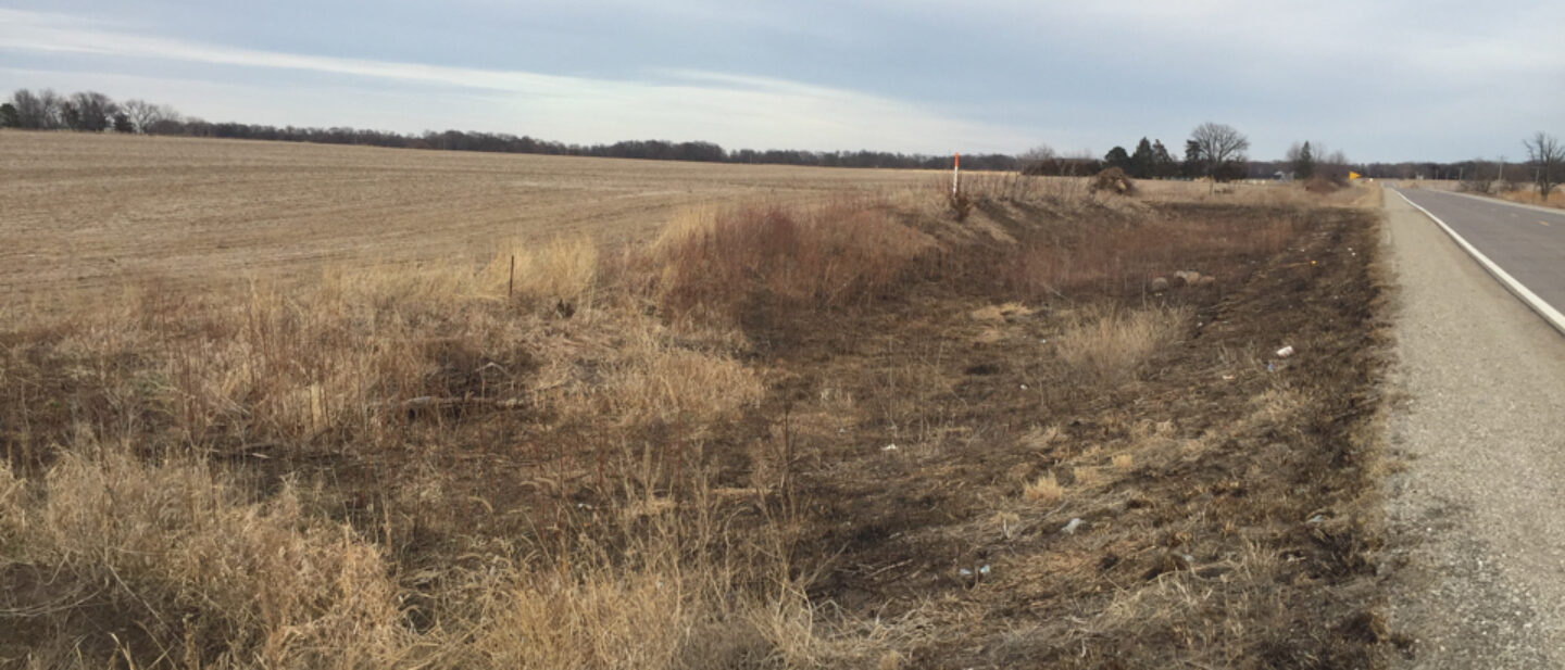 From south paved road near west former waterway looking east